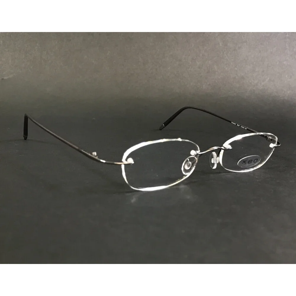 Keo Eyeglasses Frames 107 SGUN Satin Gunmetal Rimless Oval Titanium 47-20-140